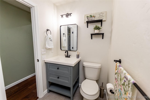 410 Denver St, Pawnee, OK 74058 - bathroom featuring vanity and wood finished floors