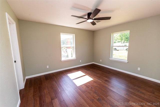 410 Denver St, Pawnee, OK 74058 - empty room featuring dark wood finished floors and ceiling fan