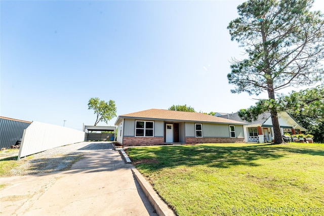 410 Denver St, Pawnee, OK 74058 - single story home with brick siding, driveway, and a front yard