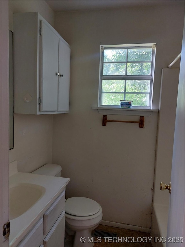 1713 E 10th St, Okmulgee, OK 74447 - full bath with vanity, a bathtub, and a shower