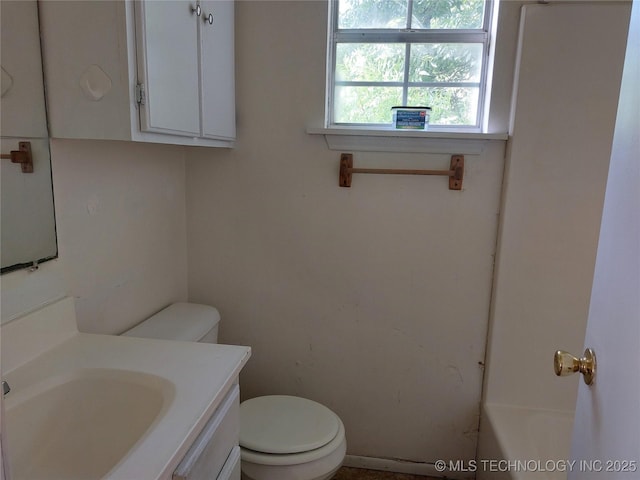 1713 E 10th St, Okmulgee, OK 74447 - full bathroom featuring vanity and a tub