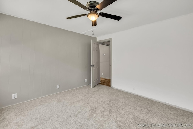 511 S Maple St, Sapulpa, OK 74066 - unfurnished bedroom featuring carpet flooring, a ceiling fan, and attic access
