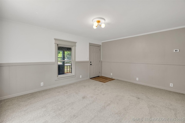 511 S Maple St, Sapulpa, OK 74066 - carpeted empty room with ornamental molding and baseboards