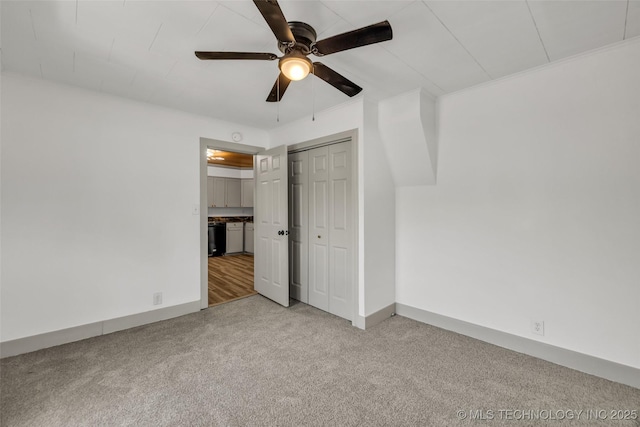 511 S Maple St, Sapulpa, OK 74066 - unfurnished bedroom featuring light colored carpet, a closet, and ceiling fan
