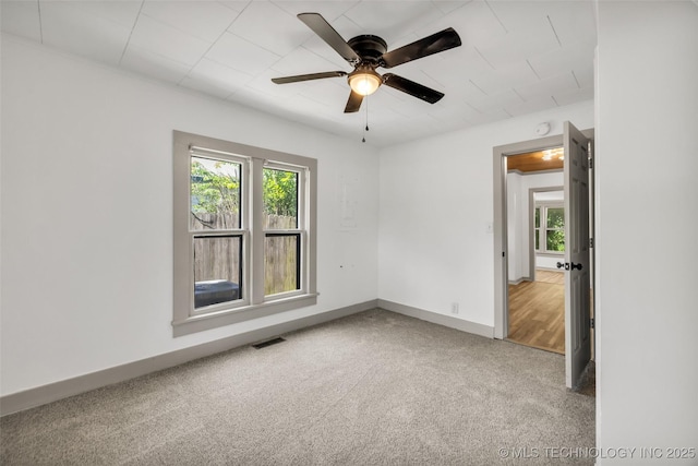 511 S Maple St, Sapulpa, OK 74066 - spare room with carpet floors, ceiling fan, and a smoke detector