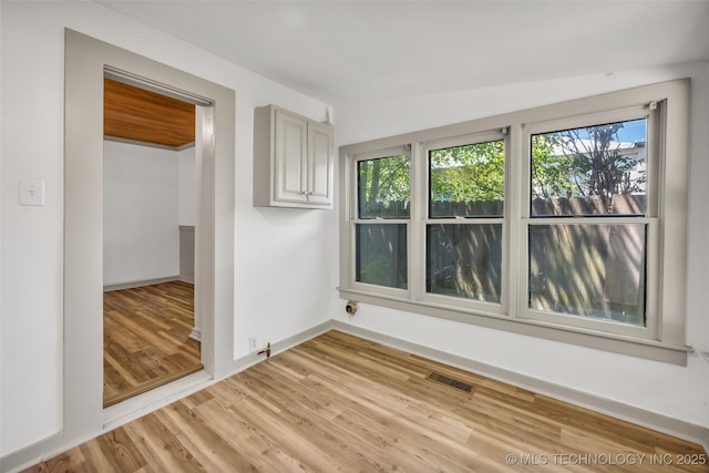 511 S Maple St, Sapulpa, OK 74066 - unfurnished room with light wood-style flooring and plenty of natural light