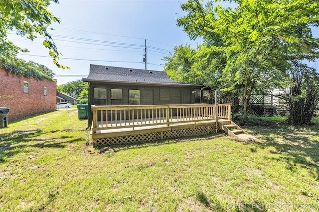 511 S Maple St, Sapulpa, OK 74066 - rear view of property with a wooden deck, a lawn, and a shingled roof