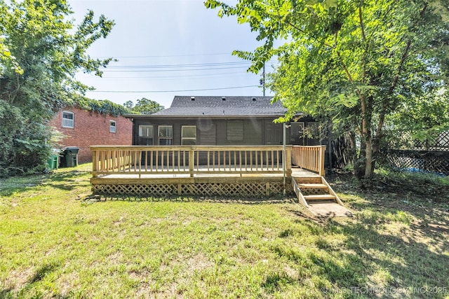 511 S Maple St, Sapulpa, OK 74066 - back of house featuring a deck, roof with shingles, and a sunroom