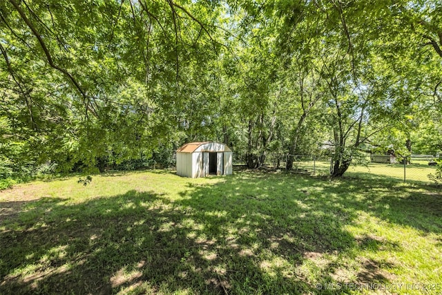 511 S Maple St, Sapulpa, OK 74066 - fenced backyard with a storage shed