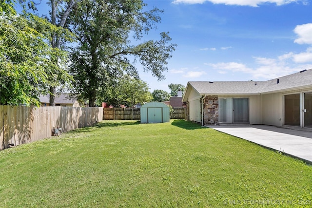 14127 E 24th Pl, Tulsa, OK 74134 - fenced backyard with a storage shed and a patio area