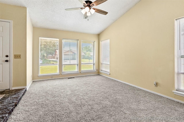 14127 E 24th Pl, Tulsa, OK 74134 - spare room with carpet, ceiling fan, a textured ceiling, and lofted ceiling