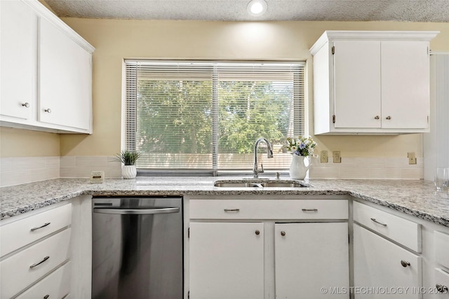 14127 E 24th Pl, Tulsa, OK 74134 - kitchen featuring dishwasher, white cabinets, plenty of natural light, and recessed lighting