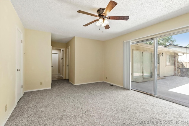 14127 E 24th Pl, Tulsa, OK 74134 - spare room with a ceiling fan, carpet flooring, and a textured ceiling