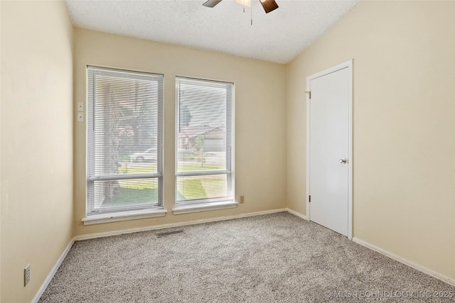 14127 E 24th Pl, Tulsa, OK 74134 - carpeted spare room featuring ceiling fan and baseboards