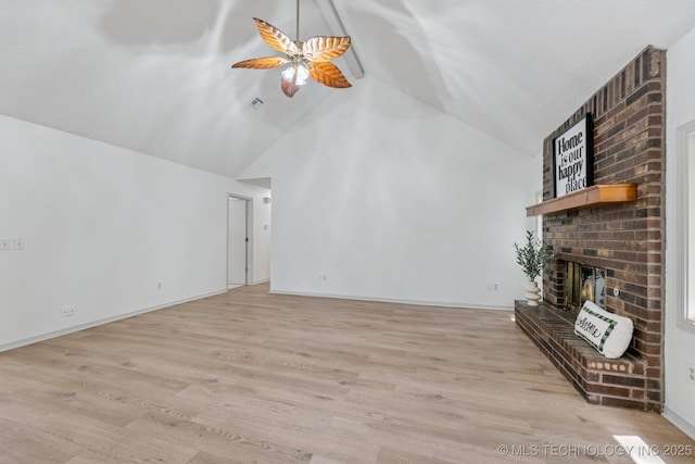 2244 W 45th St, Tulsa, OK 74107 - unfurnished living room with ceiling fan, a brick fireplace, high vaulted ceiling, and light wood-style floors