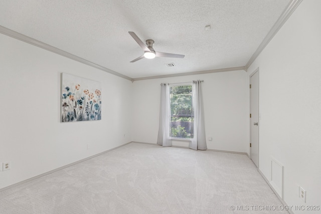 2244 W 45th St, Tulsa, OK 74107 - unfurnished room with ornamental molding, a ceiling fan, a textured ceiling, and light carpet