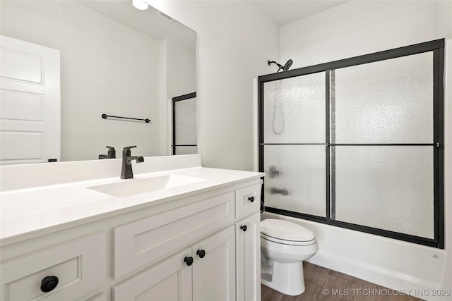 2916 S 8th St, Broken Arrow, OK 74012 - bathroom with vanity, shower / bath combination with glass door, and wood finished floors