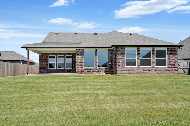2916 S 8th St, Broken Arrow, OK 74012 - rear view of property with brick siding, roof with shingles, a fenced backyard, and a patio area