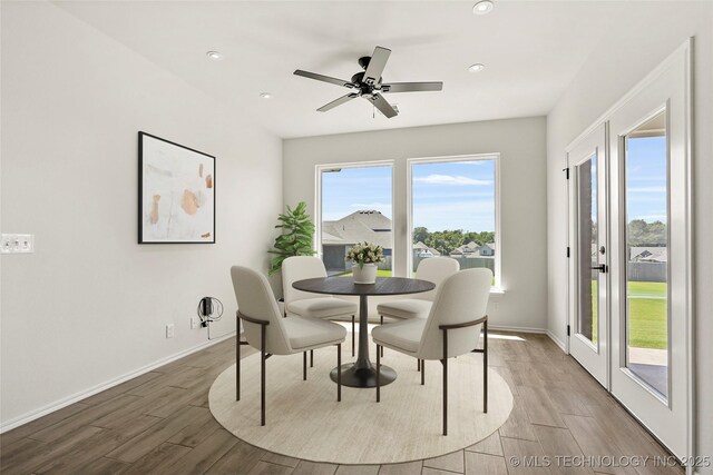 2916 S 8th St, Broken Arrow, OK 74012 - dining area with wood finished floors, recessed lighting, and ceiling fan