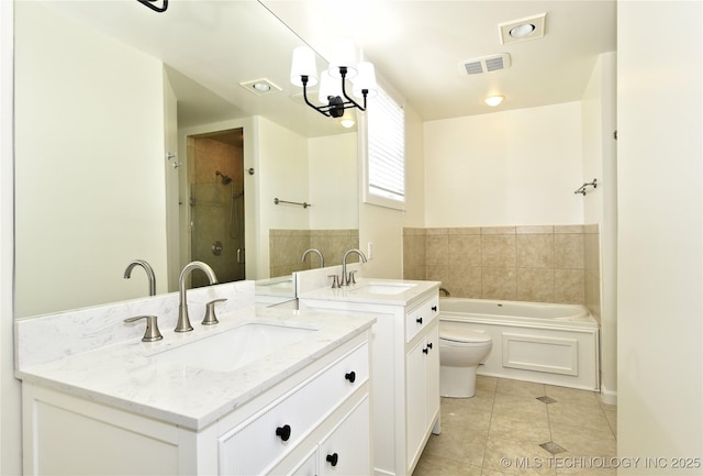 5654 S Marion Ave, Tulsa, OK 74135 - bathroom with vanity, a garden tub, tile patterned floors, and a shower
