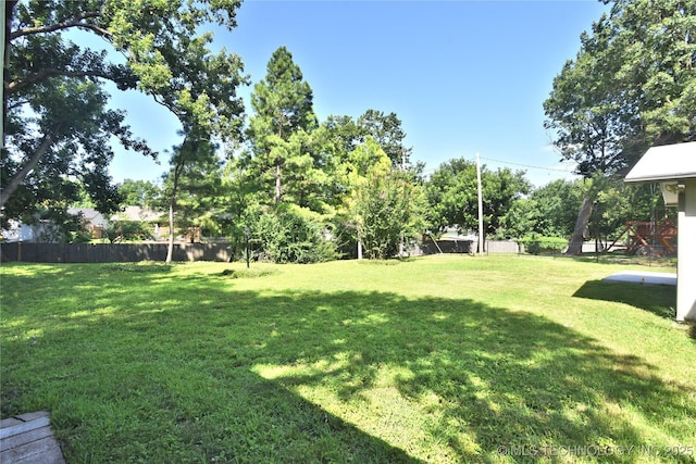 5654 S Marion Ave, Tulsa, OK 74135 - view of yard featuring a playground
