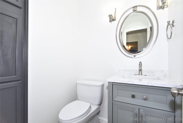 5654 S Marion Ave, Tulsa, OK 74135 - bathroom with vanity and toilet