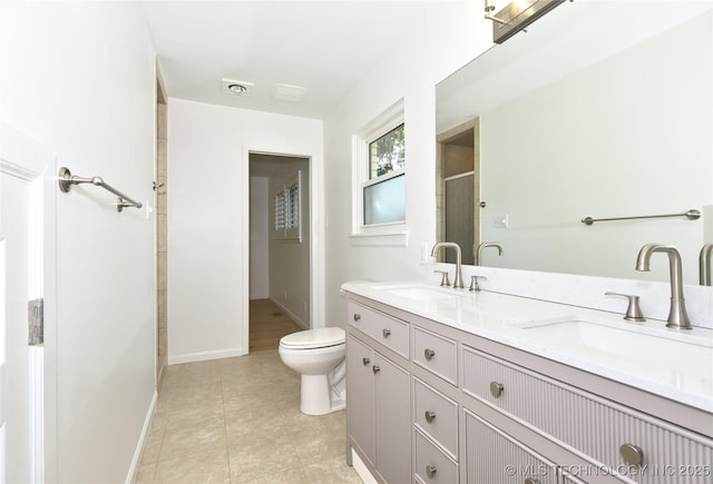 5654 S Marion Ave, Tulsa, OK 74135 - bathroom featuring an enclosed shower, double vanity, and tile patterned floors
