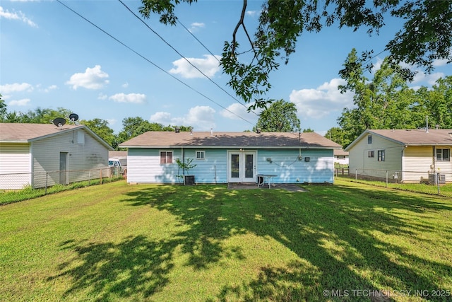 2321 S Main St, Sapulpa, OK 74066 - rear view of property featuring french doors and a fenced backyard