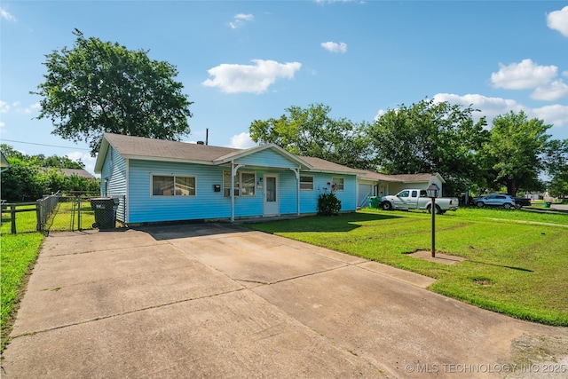 2321 S Main St, Sapulpa, OK 74066 - view of front of house with concrete driveway and a gate