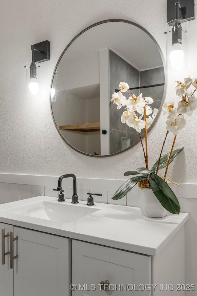 6016 S 76th E Ave, Tulsa, OK 74145 - bathroom featuring vanity and a textured wall