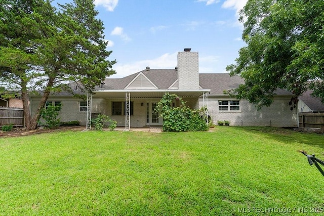 6016 S 76th E Ave, Tulsa, OK 74145 - rear view of property with brick siding, a chimney, a patio, and a shingled roof