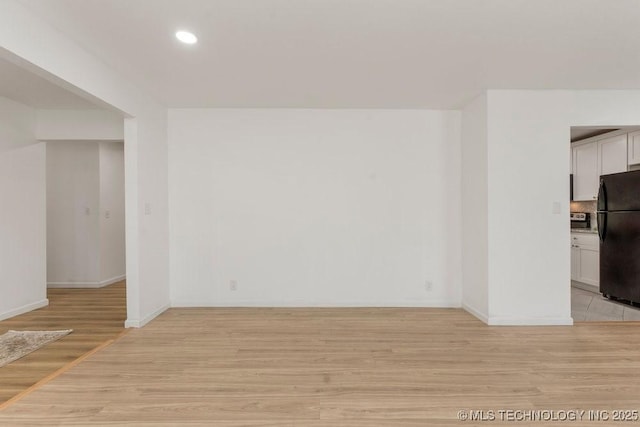 6016 S 76th E Ave, Tulsa, OK 74145 - spare room featuring light wood-style flooring and recessed lighting
