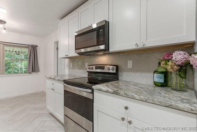 6016 S 76th E Ave, Tulsa, OK 74145 - kitchen featuring stainless steel appliances, tasteful backsplash, and white cabinets