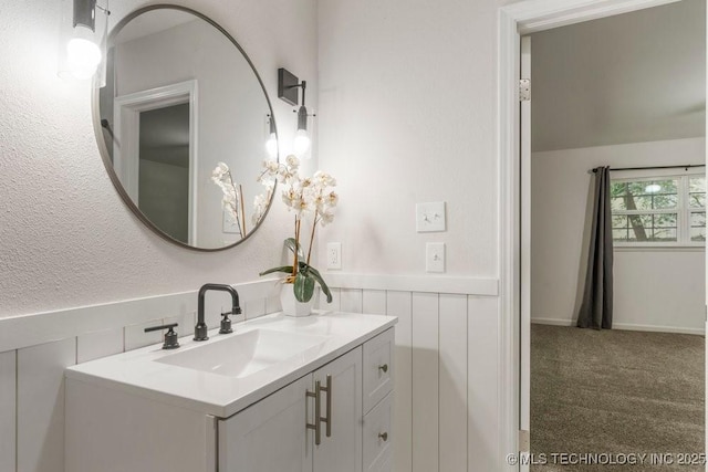 6016 S 76th E Ave, Tulsa, OK 74145 - bathroom with vanity and wainscoting