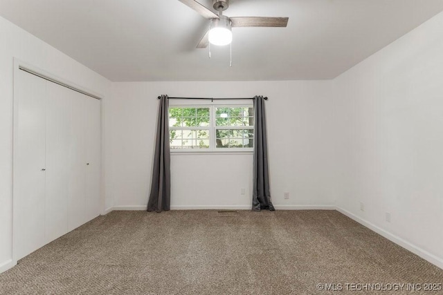 6016 S 76th E Ave, Tulsa, OK 74145 - unfurnished bedroom with carpet, a ceiling fan, and a closet