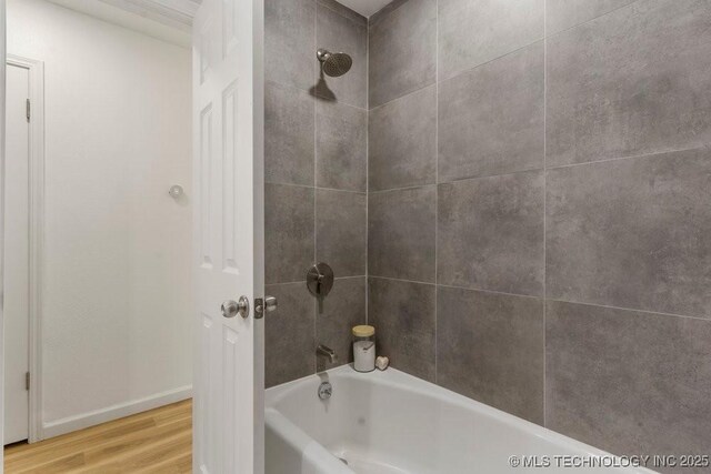 6016 S 76th E Ave, Tulsa, OK 74145 - full bathroom featuring wood finished floors and bathing tub / shower combination