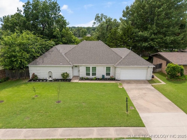 6016 S 76th E Ave, Tulsa, OK 74145 - view of front of property featuring an attached garage and concrete driveway