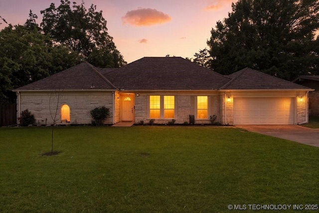 6016 S 76th E Ave, Tulsa, OK 74145 - ranch-style home with a garage, concrete driveway, a yard, and brick siding