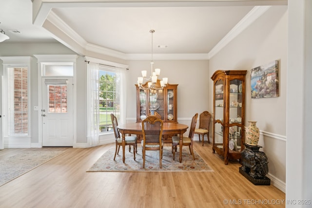 12432 S 101st E Ave, Bixby, OK 74008 - dining space with a chandelier, light wood-type flooring, and crown molding