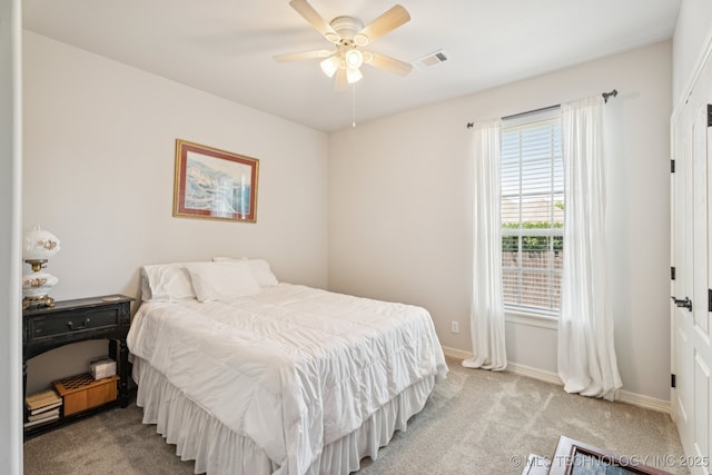 12432 S 101st E Ave, Bixby, OK 74008 - bedroom with light carpet and a ceiling fan