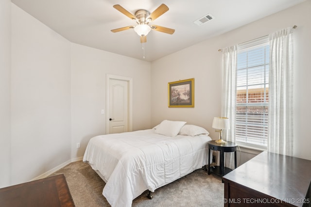 12432 S 101st E Ave, Bixby, OK 74008 - carpeted bedroom featuring baseboards and a ceiling fan