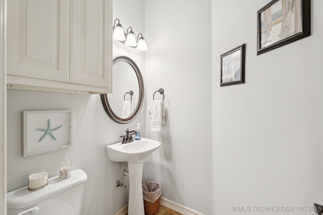 12432 S 101st E Ave, Bixby, OK 74008 - half bath featuring toilet and baseboards