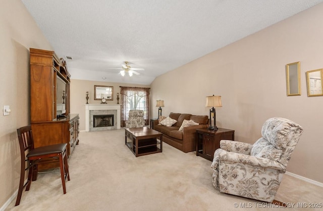 8318 S 84th E Ave, Tulsa, OK 74133 - living area with a ceiling fan, light carpet, and a fireplace with flush hearth