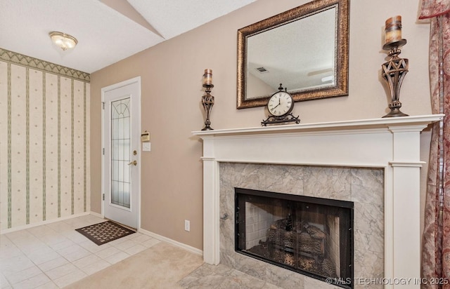 8318 S 84th E Ave, Tulsa, OK 74133 - tiled entrance foyer featuring a fireplace and baseboards