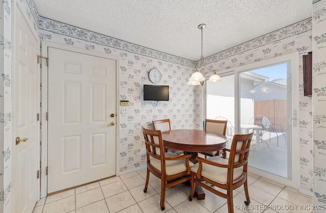 8318 S 84th E Ave, Tulsa, OK 74133 - dining room with wallpapered walls, a textured ceiling, and light tile patterned flooring