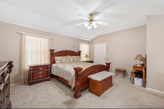 8318 S 84th E Ave, Tulsa, OK 74133 - bedroom featuring light carpet, lofted ceiling, and a ceiling fan