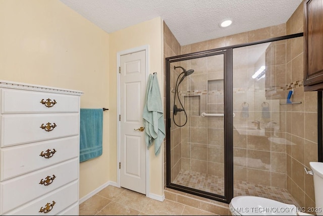 8318 S 84th E Ave, Tulsa, OK 74133 - full bath with a stall shower, a textured ceiling, and tile patterned flooring