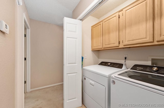 8318 S 84th E Ave, Tulsa, OK 74133 - laundry room featuring cabinet space, separate washer and dryer, light carpet, and a textured ceiling