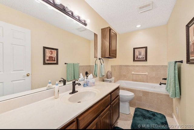 8318 S 84th E Ave, Tulsa, OK 74133 - full bath featuring a garden tub, vanity, tile patterned floors, and a textured ceiling