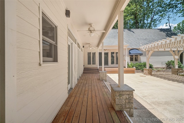 3437 E 96th Pl, Tulsa, OK 74137 - deck with ceiling fan, a patio area, and a pergola